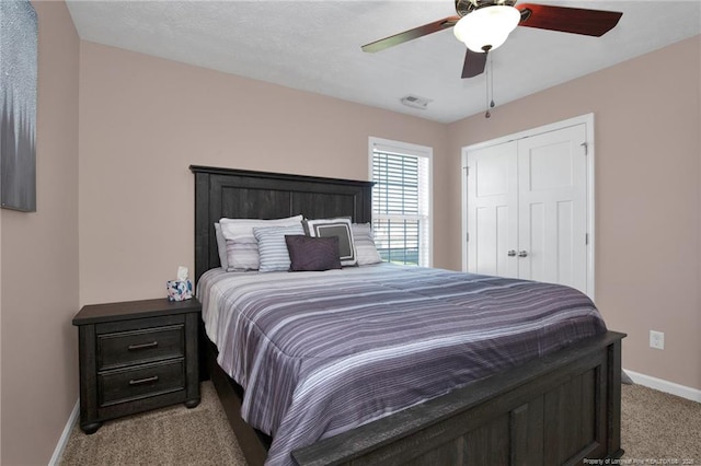 4258 Cherry Hill Ln, Fayetteville, NC 28312 - bedroom featuring a closet, visible vents, light carpet, baseboards, and a ceiling fan