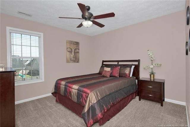 4258 Cherry Hill Ln, Fayetteville, NC 28312 - bedroom with baseboards, visible vents, ceiling fan, and light colored carpet
