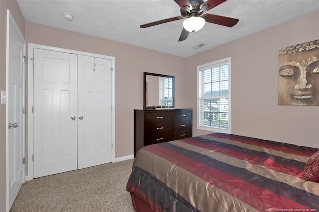 4258 Cherry Hill Ln, Fayetteville, NC 28312 - bedroom featuring visible vents, a closet, baseboards, ceiling fan, and carpet