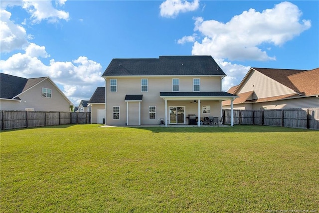4258 Cherry Hill Ln, Fayetteville, NC 28312 - back of house with a fenced backyard, a ceiling fan, a patio, and a yard