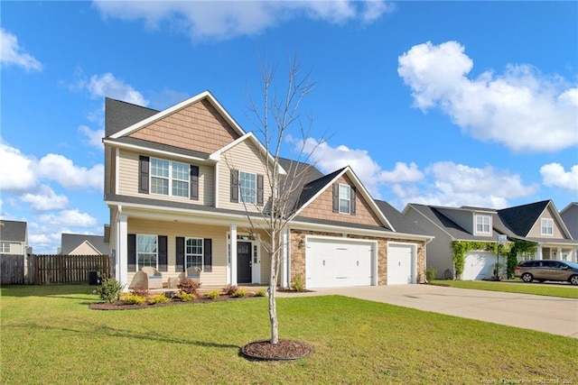 4258 Cherry Hill Ln, Fayetteville, NC 28312 - view of front of house featuring fence, a garage, a front yard, covered porch, and driveway