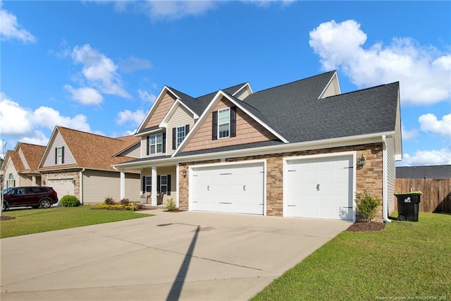 4258 Cherry Hill Ln, Fayetteville, NC 28312 - craftsman house with fence, concrete driveway, a front lawn, and stone siding