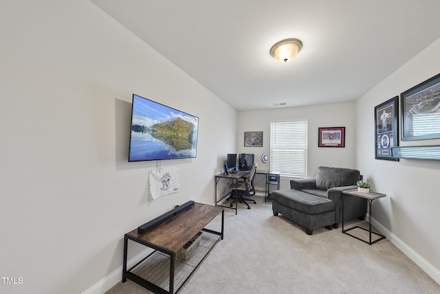 office area with baseboards, carpet flooring, and visible vents