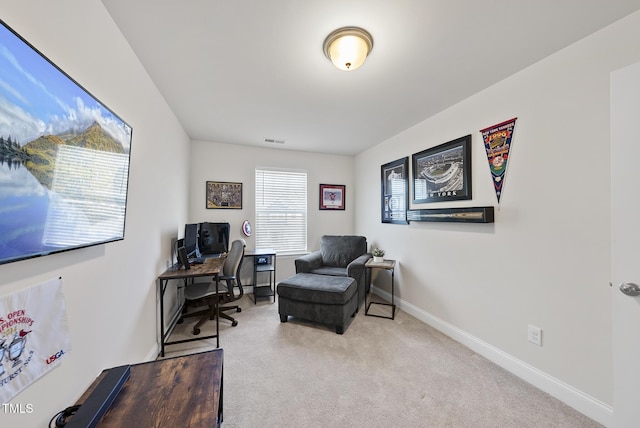 carpeted home office with baseboards and visible vents