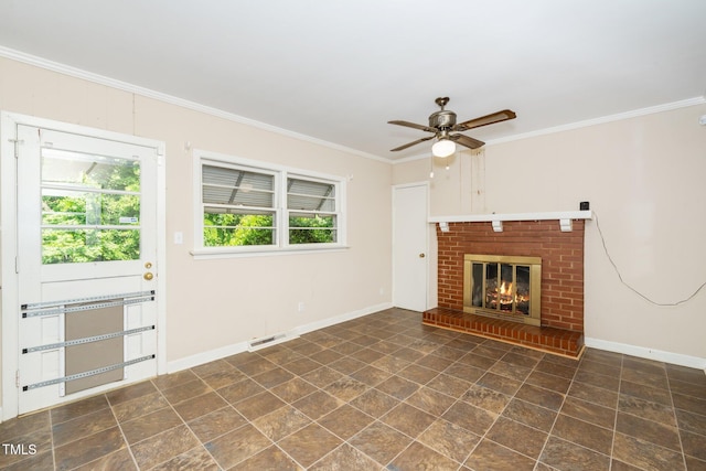 unfurnished living room with a fireplace, a ceiling fan, baseboards, visible vents, and ornamental molding