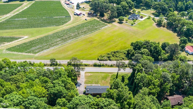 birds eye view of property featuring a rural view