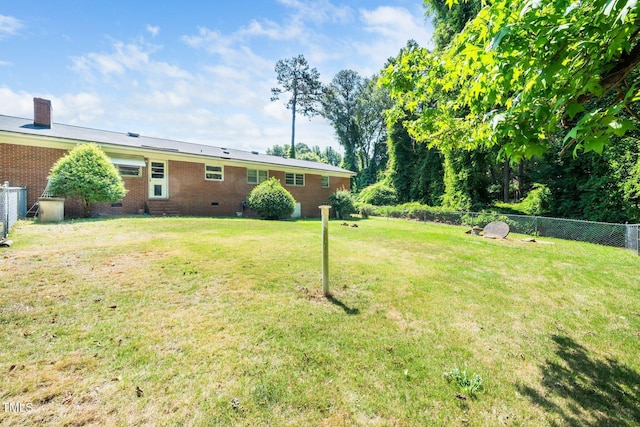 view of yard featuring fence