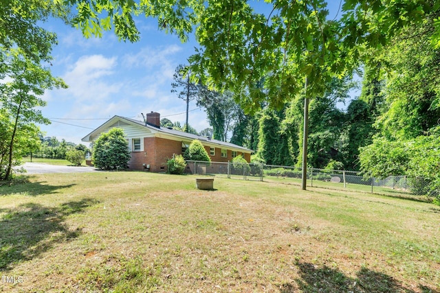 view of yard featuring fence