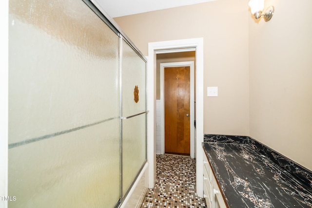 hallway with tile patterned flooring