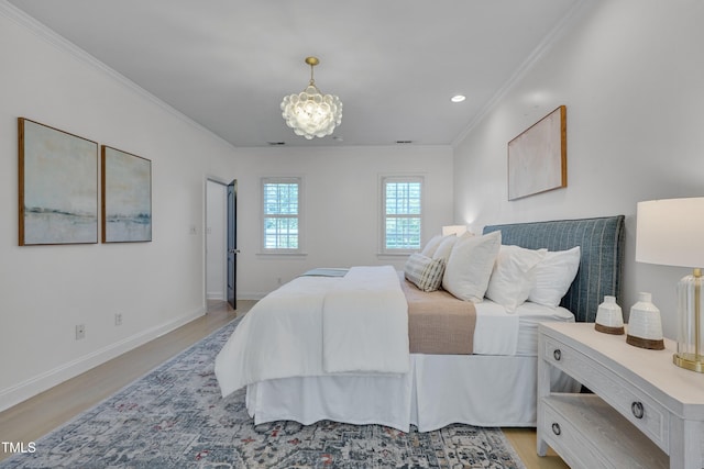 bedroom featuring crown molding, light wood-type flooring, baseboards, a chandelier, and recessed lighting
