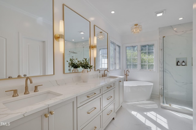 bathroom featuring a sink, a marble finish shower, ornamental molding, and marble finish floor