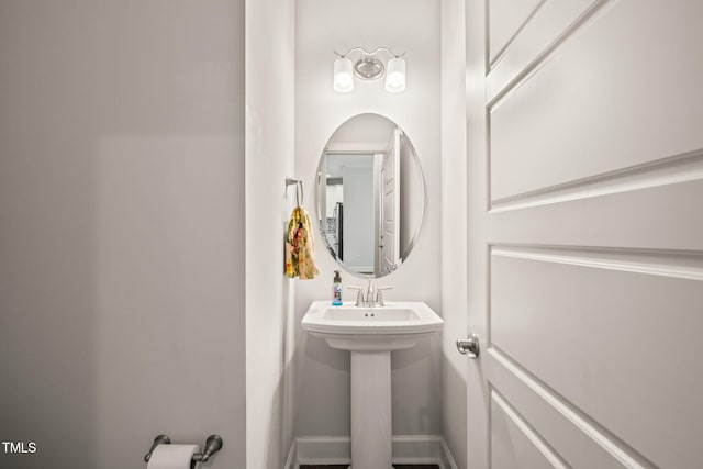 6633 Penfield St, Wake Forest, NC 27587 - half bathroom featuring baseboards