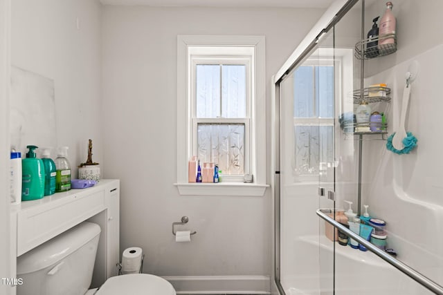 6633 Penfield St, Wake Forest, NC 27587 - bathroom with an enclosed shower, toilet, and baseboards