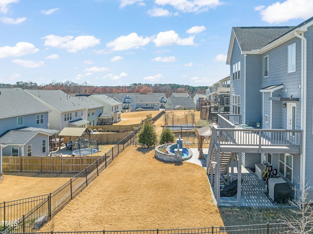 6633 Penfield St, Wake Forest, NC 27587 - exterior space featuring a residential view, a fenced backyard, a deck, and stairway