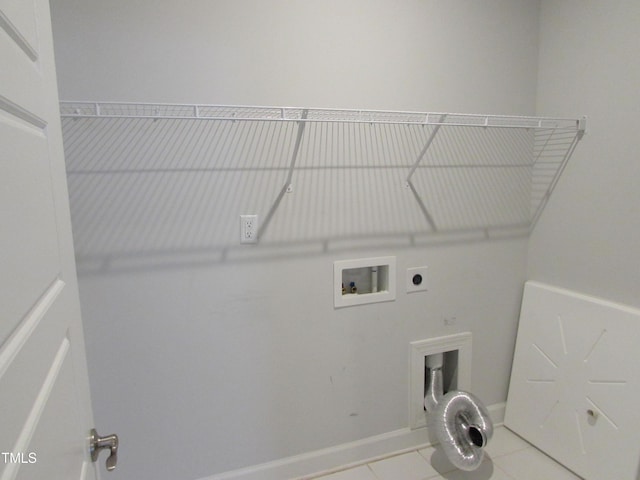 6633 Penfield St, Wake Forest, NC 27587 - clothes washing area featuring electric dryer hookup, tile patterned flooring, washer hookup, and baseboards