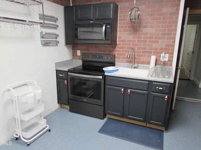 6633 Penfield St, Wake Forest, NC 27587 - kitchen featuring electric range, a sink, light countertops, and hanging light fixtures