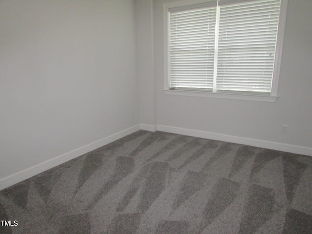 6633 Penfield St, Wake Forest, NC 27587 - carpeted empty room featuring baseboards