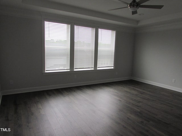 6633 Penfield St, Wake Forest, NC 27587 - spare room with a tray ceiling, a ceiling fan, dark wood finished floors, and baseboards