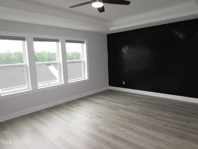 6633 Penfield St, Wake Forest, NC 27587 - empty room featuring a ceiling fan, wood finished floors, and baseboards