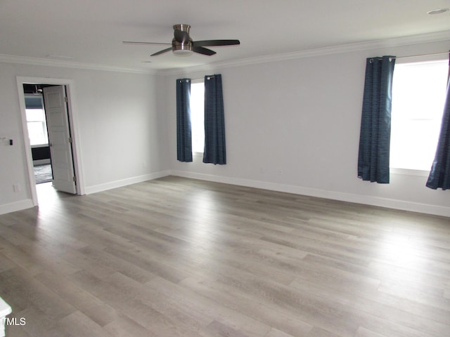 6633 Penfield St, Wake Forest, NC 27587 - unfurnished room with ornamental molding, ceiling fan, light wood finished floors, and baseboards