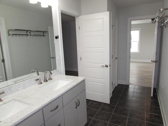 6633 Penfield St, Wake Forest, NC 27587 - full bathroom featuring tile patterned floors, baseboards, and double vanity