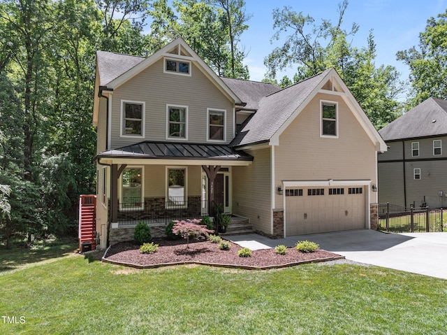 craftsman house with an attached garage, stone siding, a standing seam roof, concrete driveway, and a porch