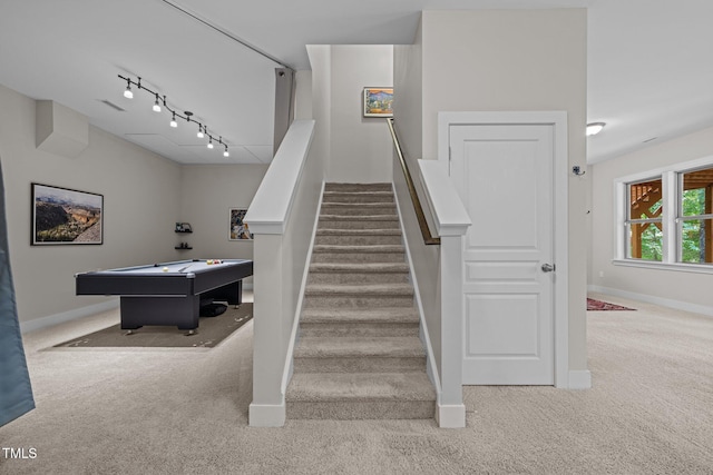 stairway featuring baseboards, carpet flooring, and billiards