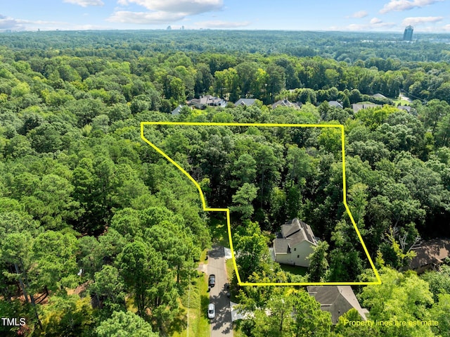 drone / aerial view with a forest view