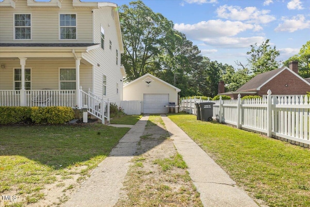 view of property exterior with fence, an outdoor structure, a detached garage, covered porch, and driveway