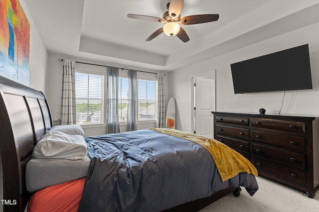 520 Austin View Blvd, Wake Forest, NC 27587 - bedroom featuring light carpet, ceiling fan, and a raised ceiling