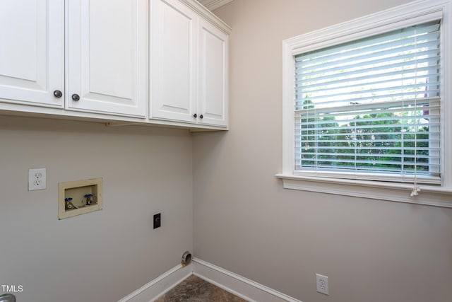 laundry room featuring cabinet space, hookup for an electric dryer, baseboards, and hookup for a washing machine