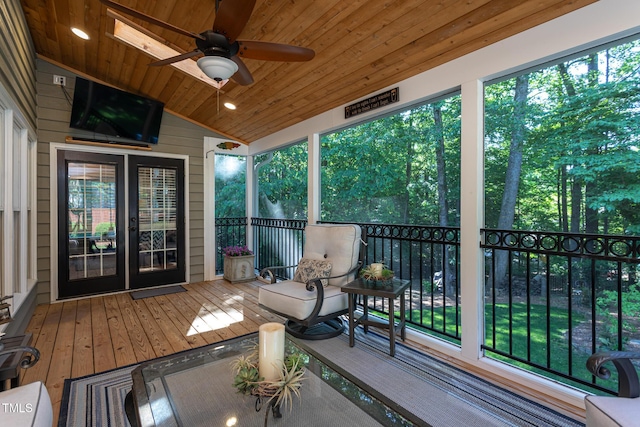 exterior space featuring a ceiling fan and visible vents