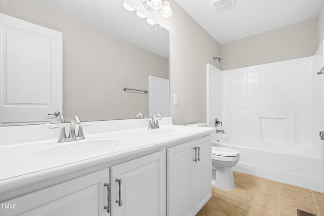 bathroom featuring visible vents, a sink, tub / shower combination, and double vanity