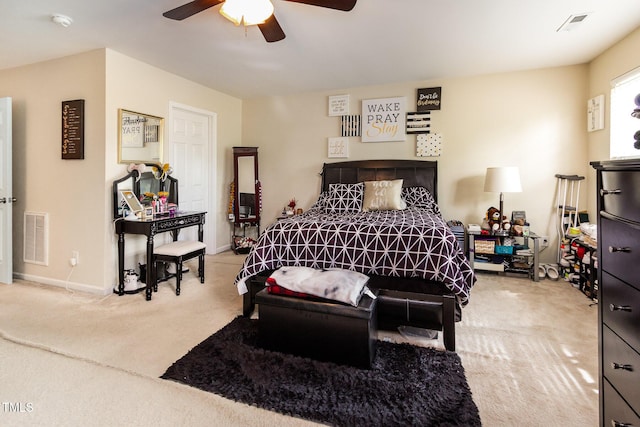 bedroom featuring carpet floors, a ceiling fan, and baseboards