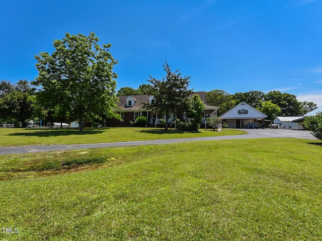 2371 NC-210, Smithfield, NC 27577 - view of front of home featuring driveway, a garage, and a front yard