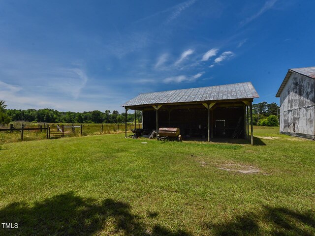 2371 NC-210, Smithfield, NC 27577 - view of yard featuring a pole building, an outdoor structure, and a carport