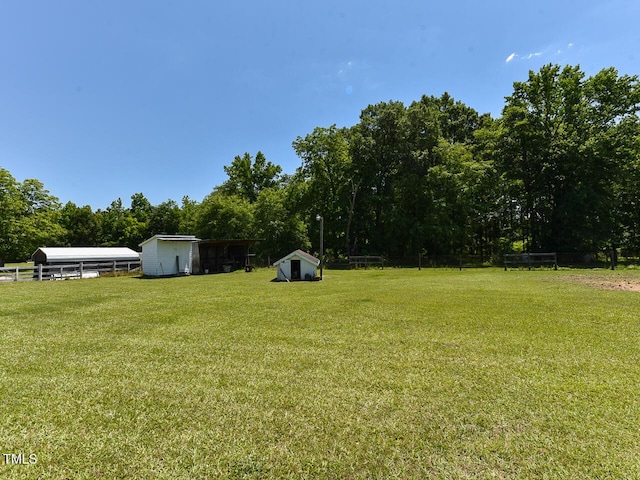 2371 NC-210, Smithfield, NC 27577 - view of yard with a carport and an outbuilding