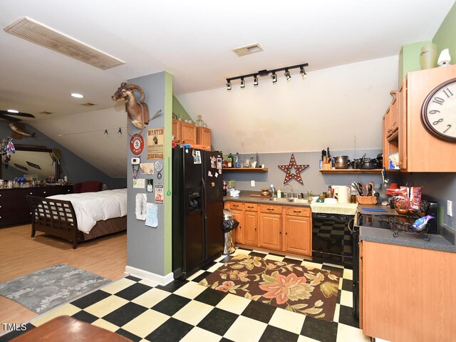 2371 NC-210, Smithfield, NC 27577 - kitchen with open shelves, black appliances, light flooring, lofted ceiling, and rail lighting