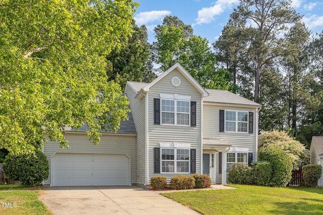 203 Downing Bluff Dr, Morrisville, NC 27560 - view of front of home featuring concrete driveway and a front lawn