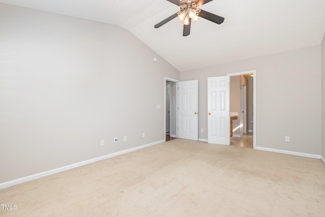 203 Downing Bluff Dr, Morrisville, NC 27560 - unfurnished bedroom with baseboards, light colored carpet, ceiling fan, and lofted ceiling