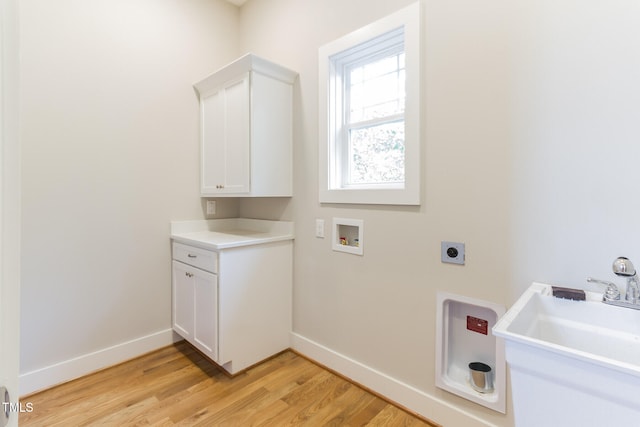 211 Page St, Morrisville, NC 27560 - clothes washing area featuring washer hookup, baseboards, light wood-style flooring, and hookup for an electric dryer