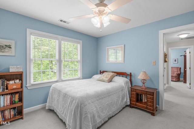 bedroom featuring carpet floors, baseboards, and ceiling fan