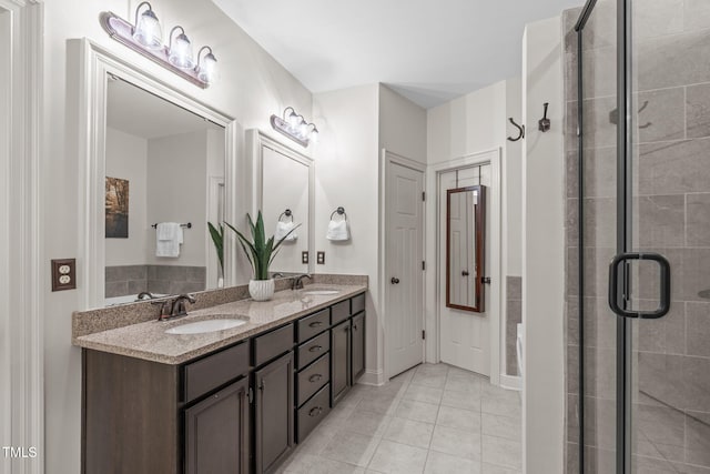 3304 Rockland Ridge Dr, Cary, NC 27519 - full bathroom with a stall shower, tile patterned flooring, and double vanity