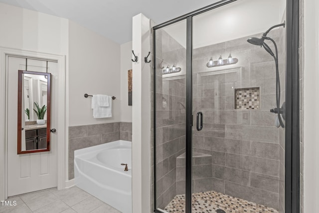 3304 Rockland Ridge Dr, Cary, NC 27519 - full bathroom featuring tile patterned flooring, a stall shower, and a garden tub