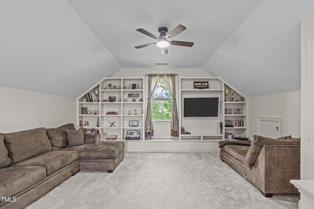 3304 Rockland Ridge Dr, Cary, NC 27519 - living room with carpet floors, vaulted ceiling, ceiling fan, and built in features