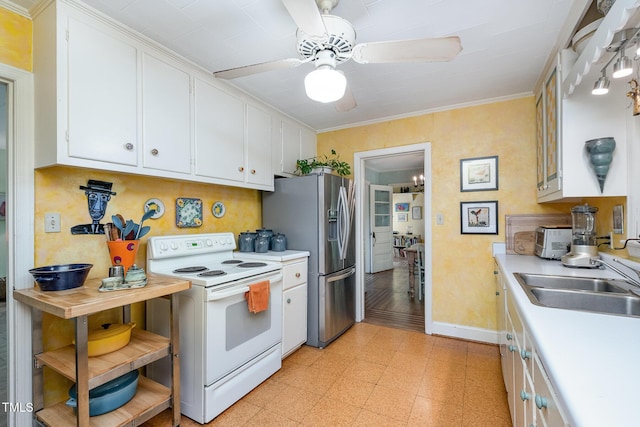 kitchen with stainless steel refrigerator with ice dispenser, white electric range, a sink, light countertops, and white cabinets