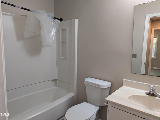 full bath with shower / bath combination, vanity, and toilet