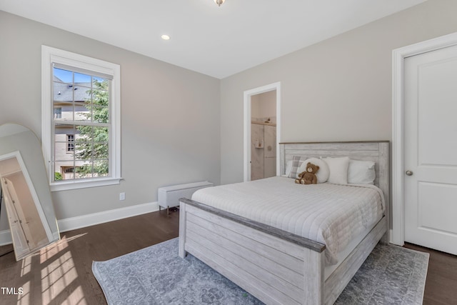 bedroom featuring baseboards, recessed lighting, radiator, and wood finished floors