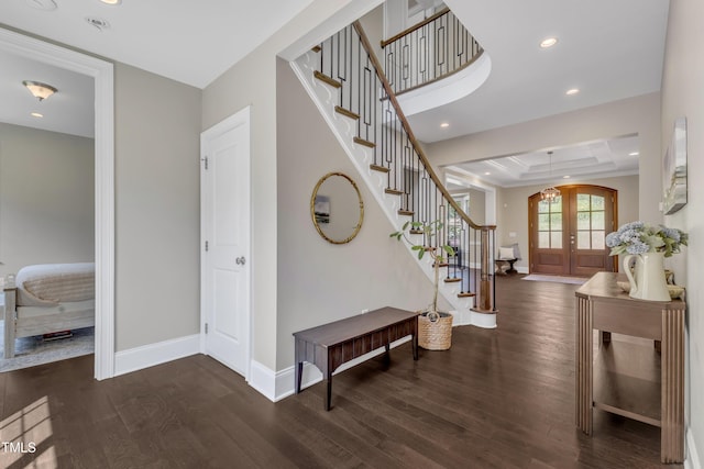entryway featuring baseboards, recessed lighting, stairs, and wood finished floors