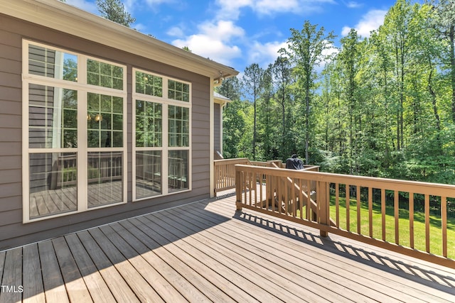 deck featuring a yard